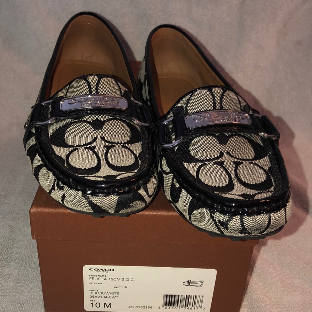 Never worn Coach loafers